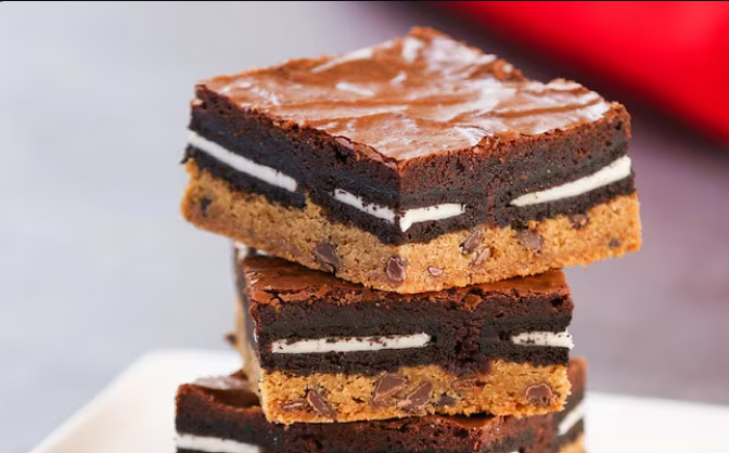 Oreo Slutty Brownies with layers of cookie dough, Oreos, and brownie