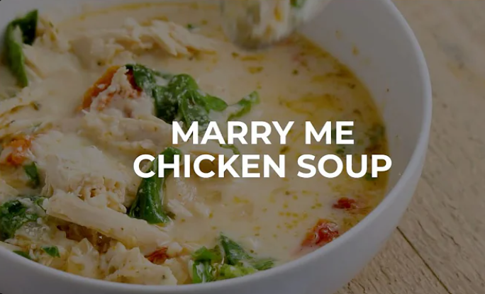 Bowl of creamy Marry Me Chicken Soup recipe with tender chicken and fresh spinach.